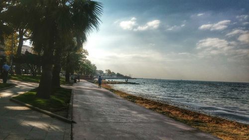 Scenic view of sea against cloudy sky