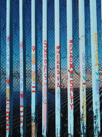 Full frame shot of multi colored pencils in row