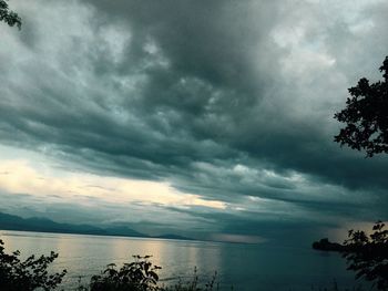 Scenic view of sea against sky at sunset