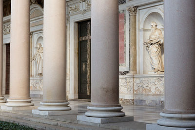 Statue in front of building