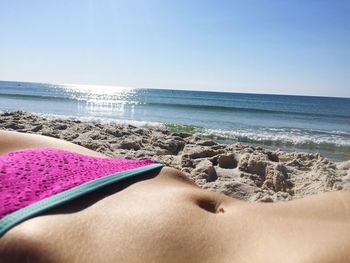 Scenic view of beach against clear sky