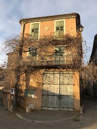 Low angle view of old building against sky