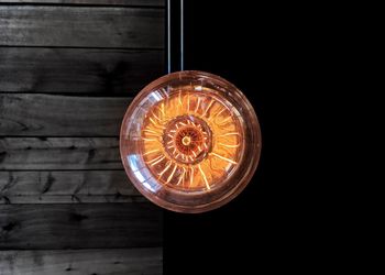 Close-up of illuminated light bulb