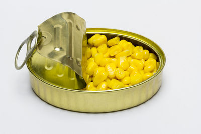 Close-up of yellow bowl on white background