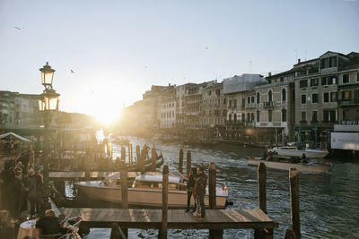 Buildings in city against clear sky