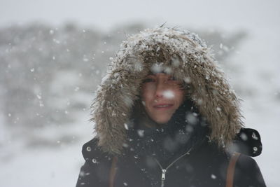 Portrait of woman in fur coat during winter