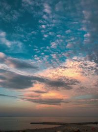 Scenic view of sea against dramatic sky