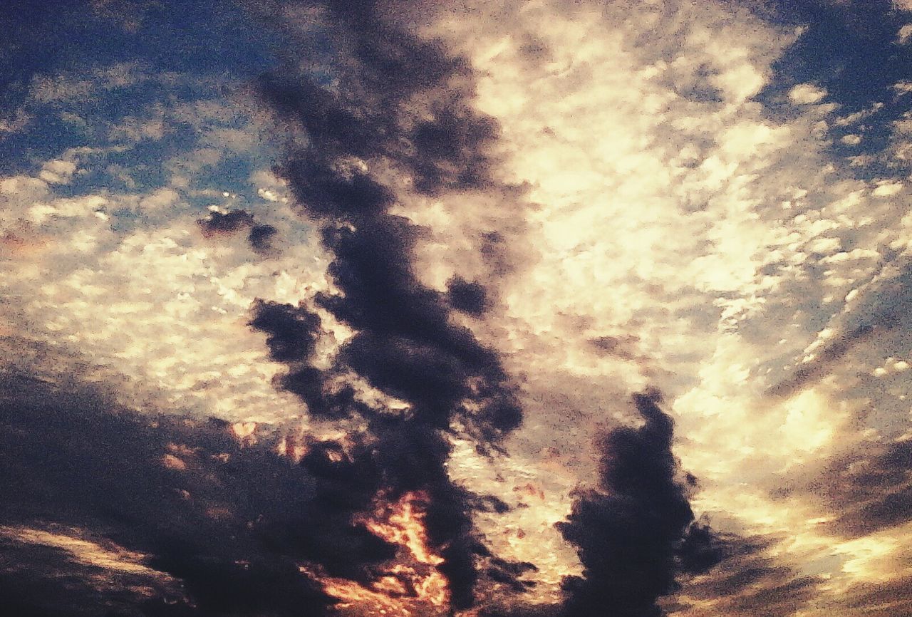 cloud - sky, sky, cloudy, low angle view, tranquility, beauty in nature, weather, nature, scenics, full frame, backgrounds, tranquil scene, silhouette, dramatic sky, outdoors, sunset, idyllic, cloud, overcast, dusk