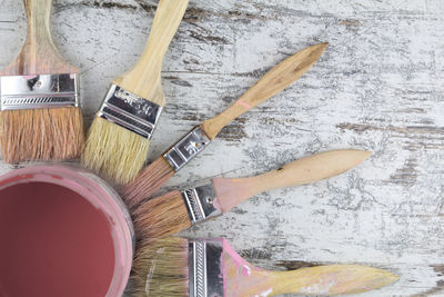 High angle view of paintbrushes on table