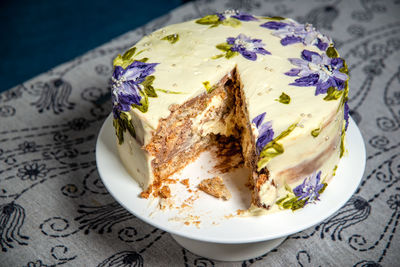 Close-up of cake served on table