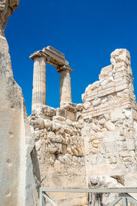 Low angle view of old temple against clear sky