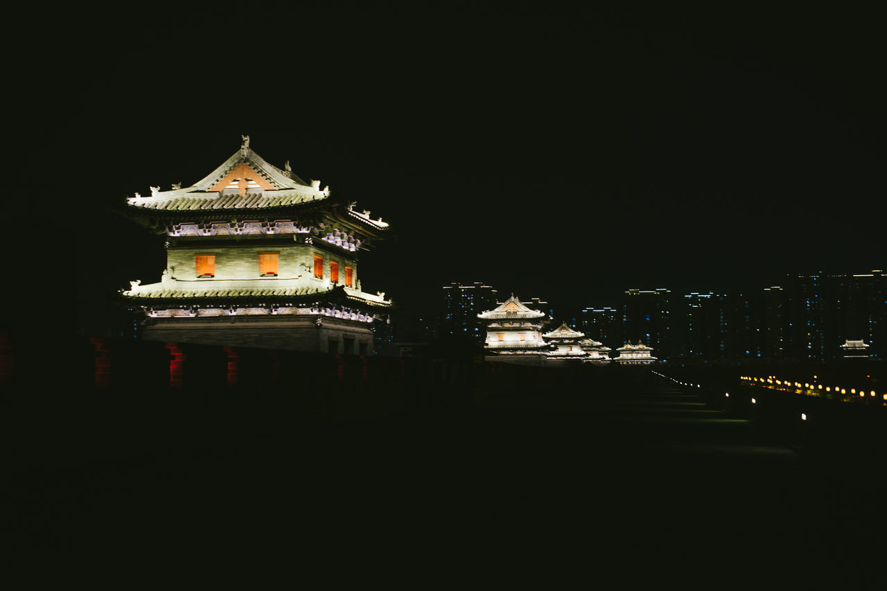 ILLUMINATED BUILDING AT NIGHT