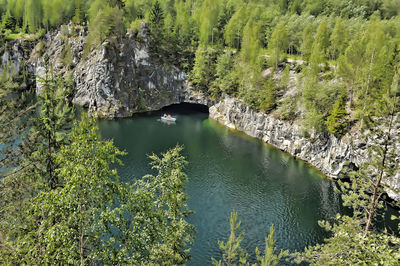 High angle view of lake amidst trees