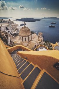 High angle view of church by sea at santorini island