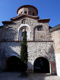 Low angle view of historic building against clear sky