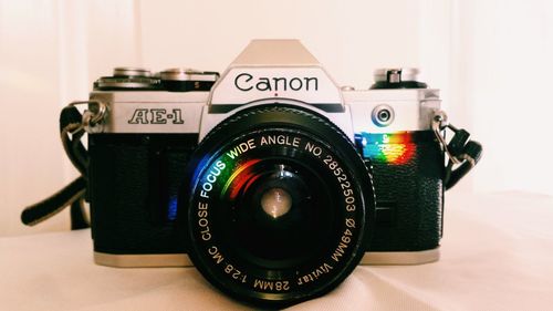 Close-up of camera on table