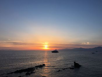 Scenic view of sunset over sea