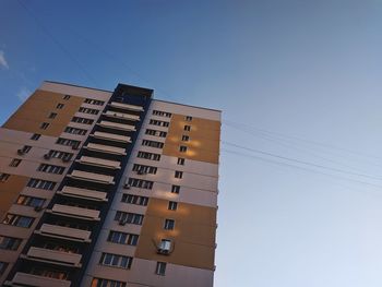 Low angle view of buildings against clear sky