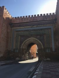 Entrance of historic building against sky