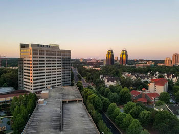 High angle view of buildings against sky during sunset