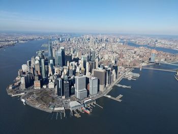 Aerial view of cityscape by river