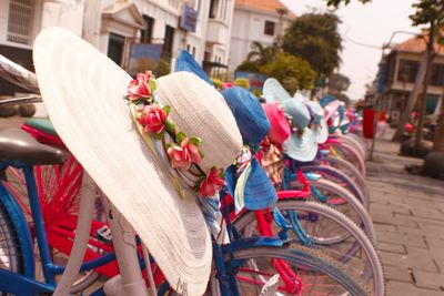 Close-up of bicycle on street in city