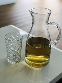 Close-up of drink in glass jar on table
