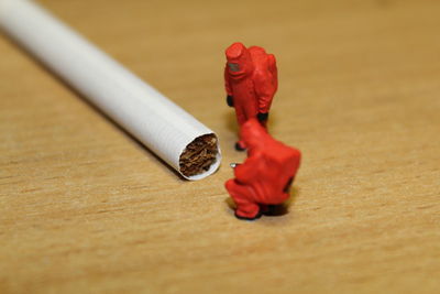 High angle view of cigarette on table