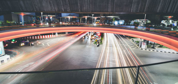 High angle view of light trails on bridge