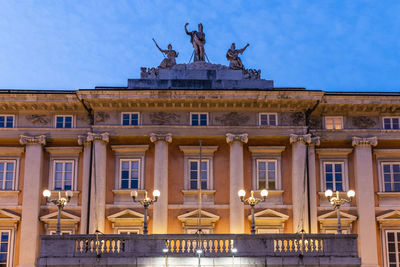 Statue of building at dusk