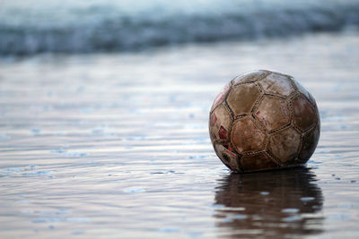 Close-up of soccer ball in water