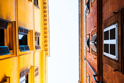 Low angle view of two residential buildings