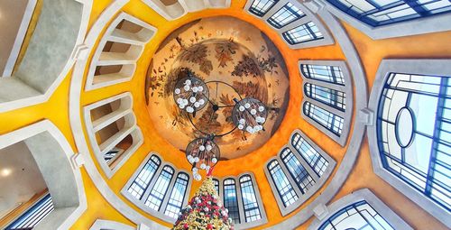 Low angle view of spiral staircase in building