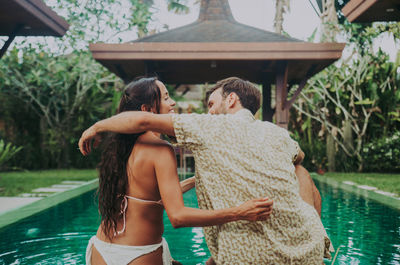 Couple kissing in swimming pool