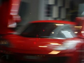 Car moving on road at night