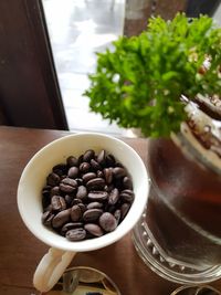 High angle view of coffee beans on table