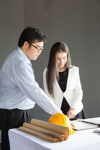 Young couple looking at camera