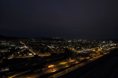 Aerial view of illuminated cityscape