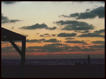 Scenic view of sea at sunset