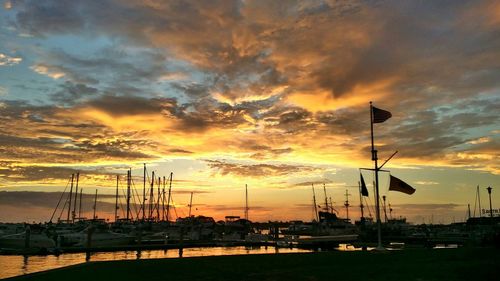 View of harbor at sunset