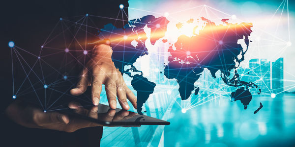 Digital composite image of hands and woman using smart phone