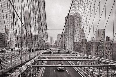 Brooklyn bridge against sky in city