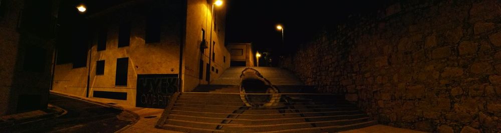 Illuminated street light at night