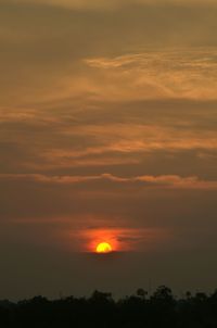 Low angle view of dramatic sky during sunset