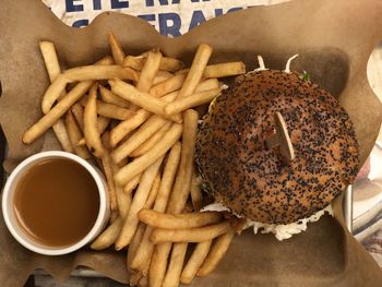 High angle view of burger and fries on table