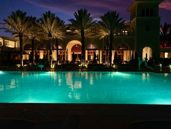 View of swimming pool at night