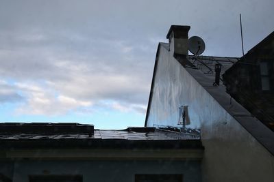 Low angle view of roof against sky