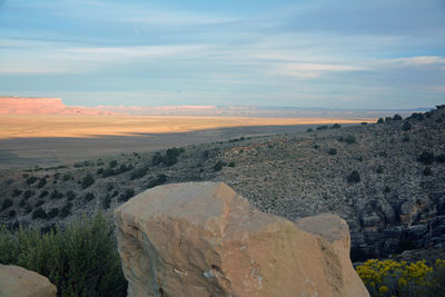 Scenic view of landscape against sky during sunset