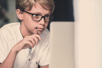 Boy using laptop