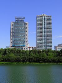 Modern skyscrapers against clear blue sky